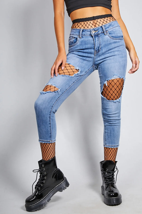Edgy Ripped Skinny Jeans with Fishnet Layer